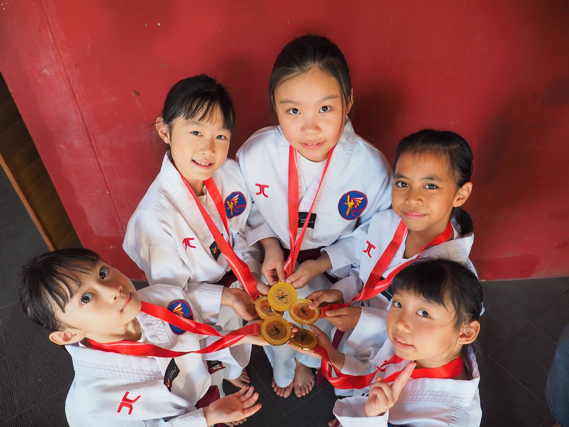 Raiders students with gold medals